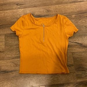 golden yellow tee
